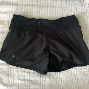 lululemon 4” black speedups size 6